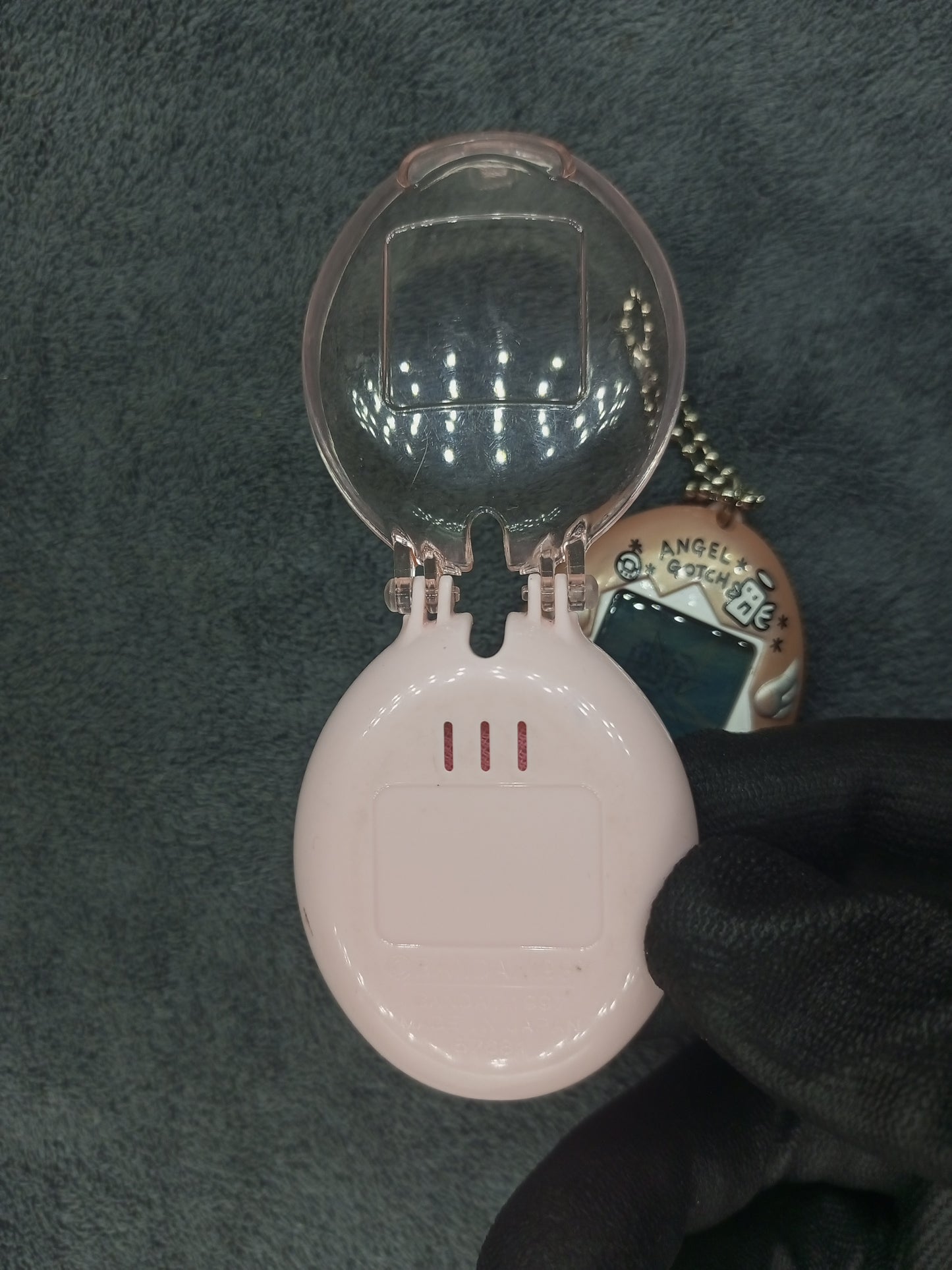 Tamagotchi Angelgoth Gray. Japan version with case  | Used ,All function work well | SKU VTVP01094